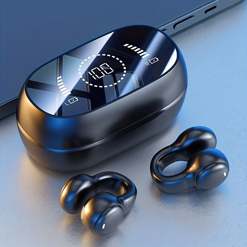 Close-up of the clip-on earphones and LED charging case